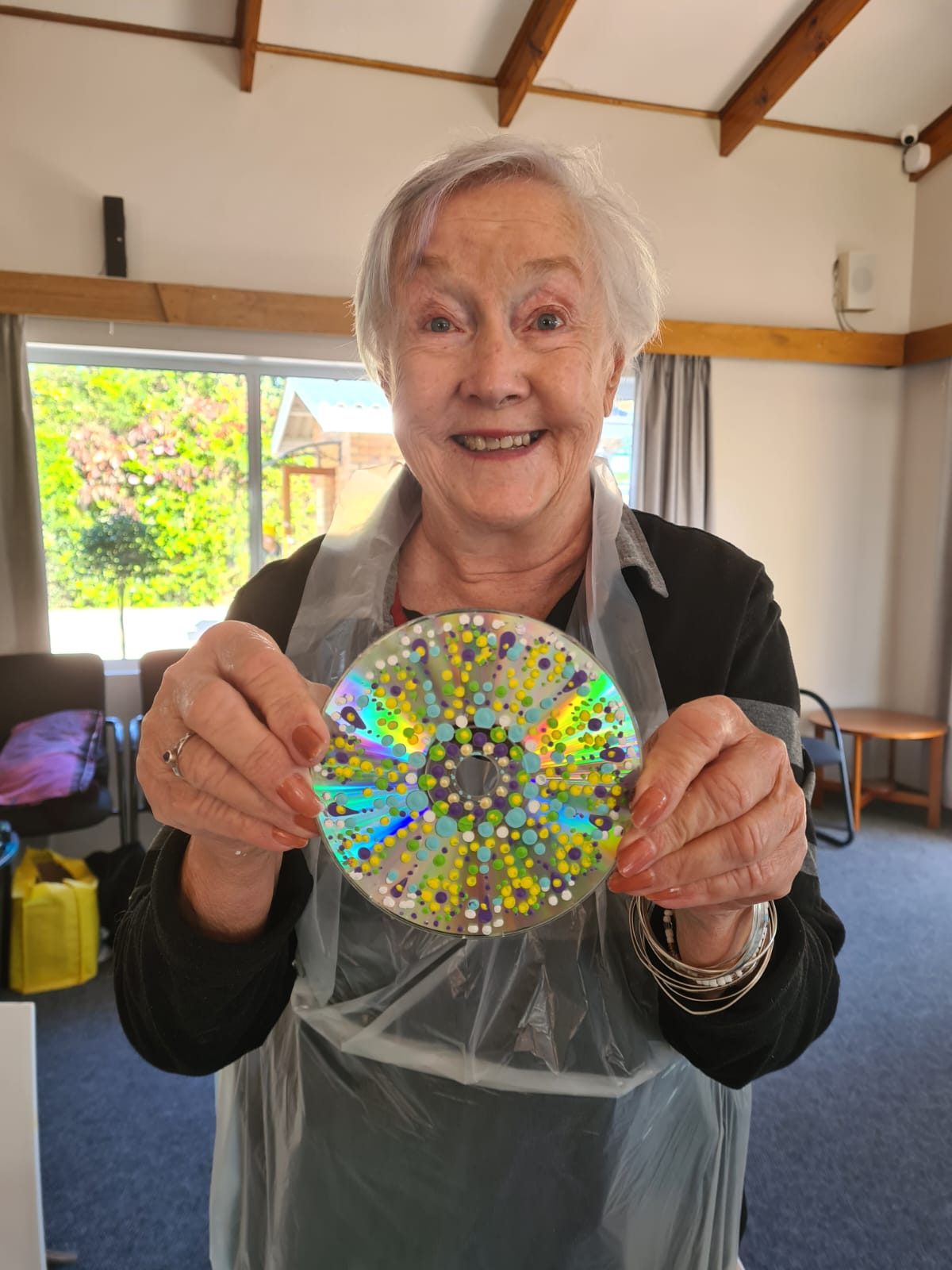 Resident with handmade dot-art