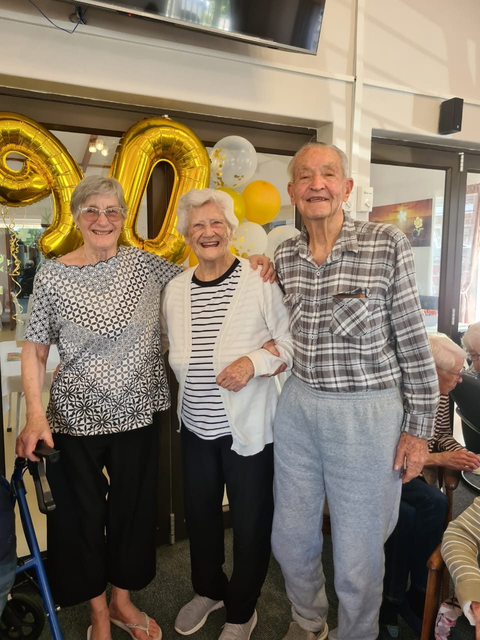 Residents celebrating a 90th birthday